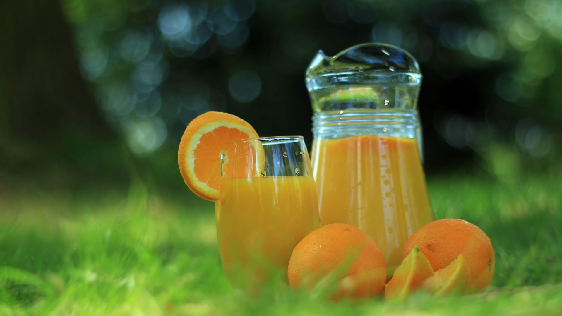 Glass of fresh orange juice with healthy food
